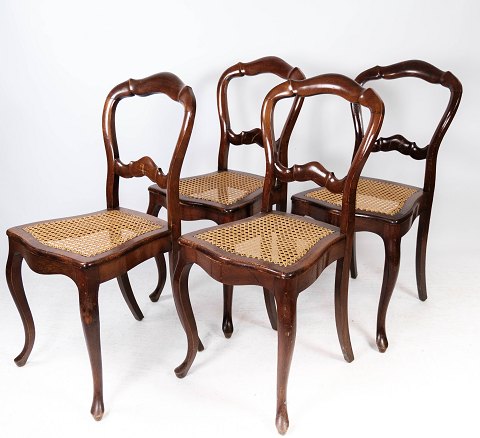 Set of four rococo dining room chairs of mahogany and with seat of paper cord 
from 1860.
5000m2 showroom.

