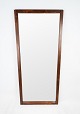 Mirror with slim frame in rosewood of danish design from the 1960s.
Great condition
