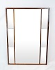 Mirror in rosewood of danish design from the 1960s.
