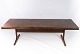 Coffee table in rosewood with shaker legs of danish design from the 1960s. 
5000m2 showroom.
